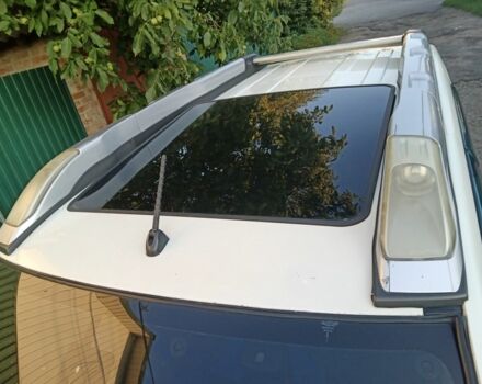 Белый Ниссан ИксТрейл, объемом двигателя 2 л и пробегом 249 тыс. км за 7999 $, фото 6 на Automoto.ua