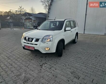 Белый Ниссан ИксТрейл, объемом двигателя 2 л и пробегом 205 тыс. км за 10799 $, фото 1 на Automoto.ua