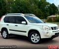 Белый Ниссан ИксТрейл, объемом двигателя 2 л и пробегом 147 тыс. км за 11200 $, фото 1 на Automoto.ua