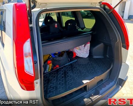 Білий Ніссан ІксТрейл, об'ємом двигуна 2 л та пробігом 183 тис. км за 11900 $, фото 3 на Automoto.ua