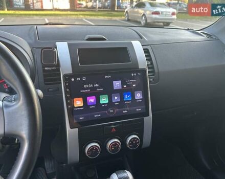 Белый Ниссан ИксТрейл, объемом двигателя 2 л и пробегом 100 тыс. км за 10800 $, фото 3 на Automoto.ua