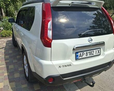 Белый Ниссан ИксТрейл, объемом двигателя 2 л и пробегом 185 тыс. км за 12000 $, фото 4 на Automoto.ua