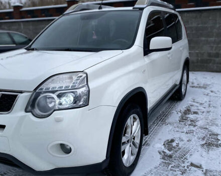 Білий Ніссан ІксТрейл, об'ємом двигуна 2 л та пробігом 220 тис. км за 12800 $, фото 4 на Automoto.ua