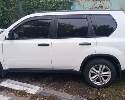 Белый Ниссан ИксТрейл, объемом двигателя 2 л и пробегом 275 тыс. км за 11000 $, фото 4 на Automoto.ua