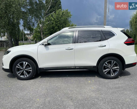 Белый Ниссан ИксТрейл, объемом двигателя 2 л и пробегом 100 тыс. км за 24200 $, фото 4 на Automoto.ua