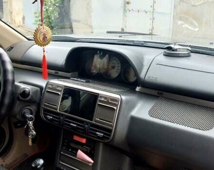 Бежевый Ниссан ИксТрейл, объемом двигателя 2 л и пробегом 375 тыс. км за 5500 $, фото 4 на Automoto.ua