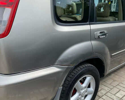 Бежевый Ниссан ИксТрейл, объемом двигателя 2 л и пробегом 305 тыс. км за 4700 $, фото 4 на Automoto.ua