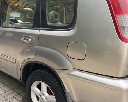 Бежевый Ниссан ИксТрейл, объемом двигателя 2 л и пробегом 305 тыс. км за 4700 $, фото 2 на Automoto.ua