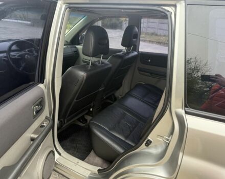 Бежевый Ниссан ИксТрейл, объемом двигателя 2.5 л и пробегом 265 тыс. км за 6000 $, фото 14 на Automoto.ua