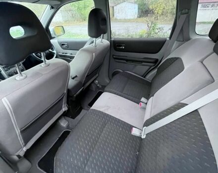 Бежевый Ниссан ИксТрейл, объемом двигателя 2 л и пробегом 177 тыс. км за 3771 $, фото 8 на Automoto.ua