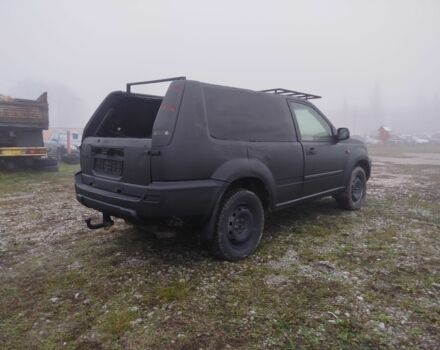 Черный Ниссан ИксТрейл, объемом двигателя 2.2 л и пробегом 300 тыс. км за 3000 $, фото 5 на Automoto.ua