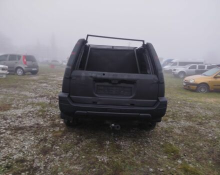 Черный Ниссан ИксТрейл, объемом двигателя 2.2 л и пробегом 300 тыс. км за 3000 $, фото 3 на Automoto.ua