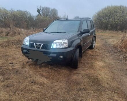 Черный Ниссан ИксТрейл, объемом двигателя 2.2 л и пробегом 290 тыс. км за 4500 $, фото 4 на Automoto.ua