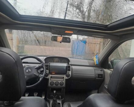 Черный Ниссан ИксТрейл, объемом двигателя 2.2 л и пробегом 290 тыс. км за 4500 $, фото 6 на Automoto.ua