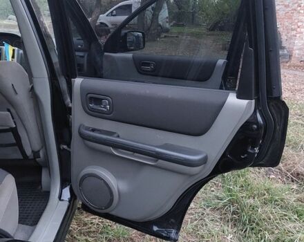 Черный Ниссан ИксТрейл, объемом двигателя 2.2 л и пробегом 260 тыс. км за 3000 $, фото 11 на Automoto.ua