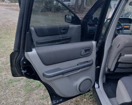 Черный Ниссан ИксТрейл, объемом двигателя 2.2 л и пробегом 260 тыс. км за 3000 $, фото 10 на Automoto.ua