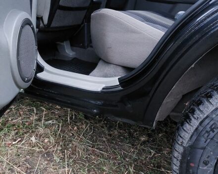 Черный Ниссан ИксТрейл, объемом двигателя 2.2 л и пробегом 260 тыс. км за 3000 $, фото 12 на Automoto.ua