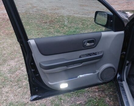 Черный Ниссан ИксТрейл, объемом двигателя 2.2 л и пробегом 260 тыс. км за 3000 $, фото 8 на Automoto.ua