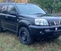 Черный Ниссан ИксТрейл, объемом двигателя 2.2 л и пробегом 260 тыс. км за 3000 $, фото 2 на Automoto.ua