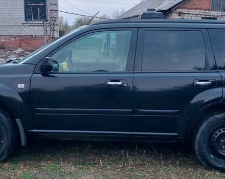 Черный Ниссан ИксТрейл, объемом двигателя 2.2 л и пробегом 260 тыс. км за 3000 $, фото 5 на Automoto.ua