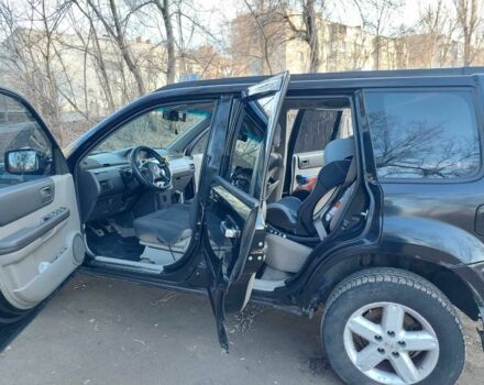 Черный Ниссан ИксТрейл, объемом двигателя 2 л и пробегом 250 тыс. км за 6533 $, фото 2 на Automoto.ua