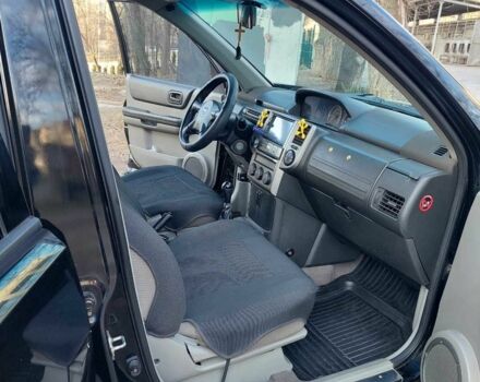 Черный Ниссан ИксТрейл, объемом двигателя 2 л и пробегом 250 тыс. км за 6533 $, фото 3 на Automoto.ua