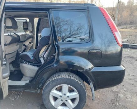 Черный Ниссан ИксТрейл, объемом двигателя 2 л и пробегом 250 тыс. км за 6533 $, фото 4 на Automoto.ua