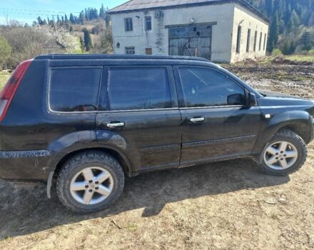 Чорний Ніссан ІксТрейл, об'ємом двигуна 2 л та пробігом 229 тис. км за 4140 $, фото 6 на Automoto.ua