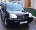 Чорний Ніссан ІксТрейл, об'ємом двигуна 2 л та пробігом 232 тис. км за 5800 $, фото 1 на Automoto.ua