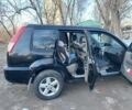 Черный Ниссан ИксТрейл, объемом двигателя 2 л и пробегом 250 тыс. км за 6533 $, фото 5 на Automoto.ua