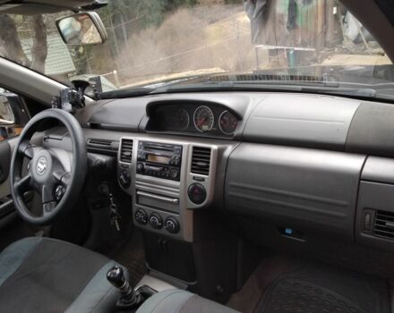 Чорний Ніссан ІксТрейл, об'ємом двигуна 2.2 л та пробігом 300 тис. км за 8281 $, фото 7 на Automoto.ua