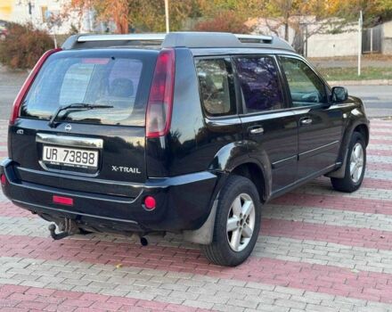 Черный Ниссан ИксТрейл, объемом двигателя 2.2 л и пробегом 250 тыс. км за 2500 $, фото 5 на Automoto.ua