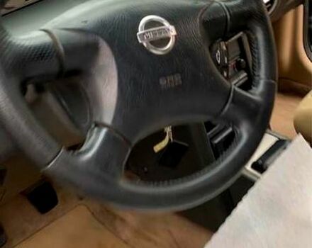 Черный Ниссан ИксТрейл, объемом двигателя 2.2 л и пробегом 372 тыс. км за 3500 $, фото 4 на Automoto.ua