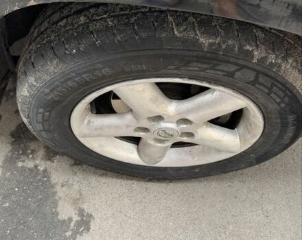 Черный Ниссан ИксТрейл, объемом двигателя 2.2 л и пробегом 385 тыс. км за 2800 $, фото 2 на Automoto.ua