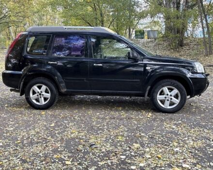 Черный Ниссан ИксТрейл, объемом двигателя 2.2 л и пробегом 275 тыс. км за 3000 $, фото 7 на Automoto.ua