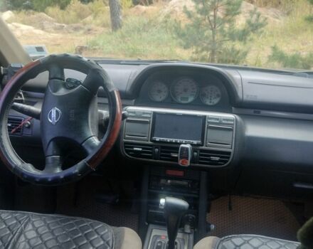 Черный Ниссан ИксТрейл, объемом двигателя 2 л и пробегом 302 тыс. км за 3984 $, фото 5 на Automoto.ua