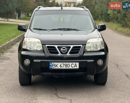 Черный Ниссан ИксТрейл, объемом двигателя 2 л и пробегом 260 тыс. км за 5300 $, фото 1 на Automoto.ua