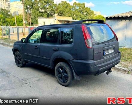 Черный Ниссан ИксТрейл, объемом двигателя 2 л и пробегом 300 тыс. км за 2550 $, фото 1 на Automoto.ua