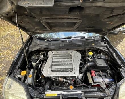 Черный Ниссан ИксТрейл, объемом двигателя 2.2 л и пробегом 275 тыс. км за 3000 $, фото 11 на Automoto.ua