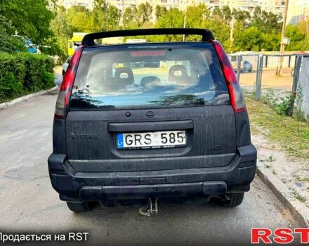 Черный Ниссан ИксТрейл, объемом двигателя 2 л и пробегом 300 тыс. км за 2550 $, фото 4 на Automoto.ua