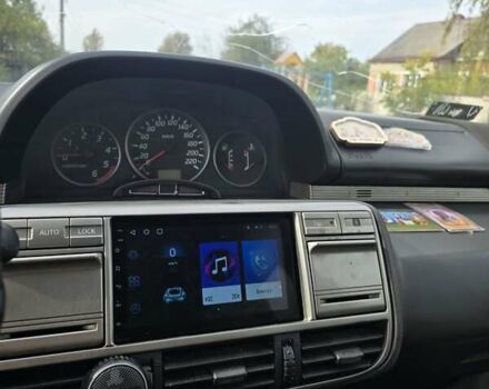 Черный Ниссан ИксТрейл, объемом двигателя 2.2 л и пробегом 300 тыс. км за 3300 $, фото 8 на Automoto.ua