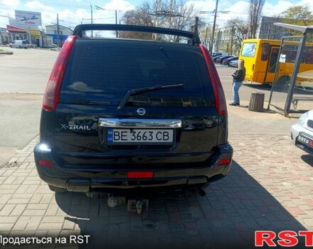 Черный Ниссан ИксТрейл, объемом двигателя 2.2 л и пробегом 333 тыс. км за 6500 $, фото 7 на Automoto.ua