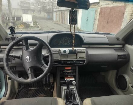 Черный Ниссан ИксТрейл, объемом двигателя 2.2 л и пробегом 220 тыс. км за 3350 $, фото 4 на Automoto.ua