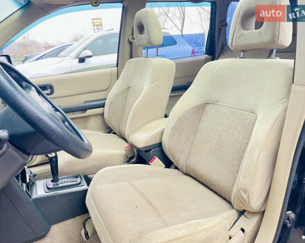 Черный Ниссан ИксТрейл, объемом двигателя 2 л и пробегом 320 тыс. км за 5600 $, фото 6 на Automoto.ua