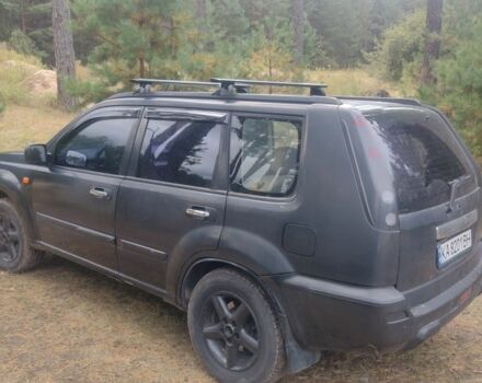 Черный Ниссан ИксТрейл, объемом двигателя 2 л и пробегом 302 тыс. км за 3984 $, фото 9 на Automoto.ua