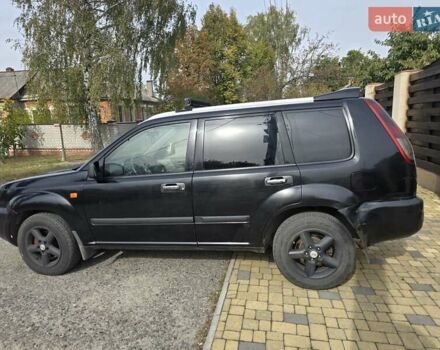 Черный Ниссан ИксТрейл, объемом двигателя 2.2 л и пробегом 300 тыс. км за 3300 $, фото 11 на Automoto.ua