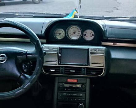 Черный Ниссан ИксТрейл, объемом двигателя 2 л и пробегом 300 тыс. км за 5500 $, фото 13 на Automoto.ua