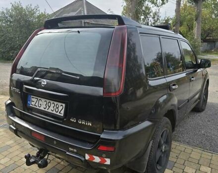 Черный Ниссан ИксТрейл, объемом двигателя 2.2 л и пробегом 300 тыс. км за 3300 $, фото 4 на Automoto.ua