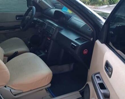 Черный Ниссан ИксТрейл, объемом двигателя 2 л и пробегом 300 тыс. км за 6300 $, фото 12 на Automoto.ua