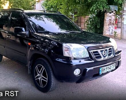 Черный Ниссан ИксТрейл, объемом двигателя 2 л и пробегом 250 тыс. км за 6300 $, фото 1 на Automoto.ua